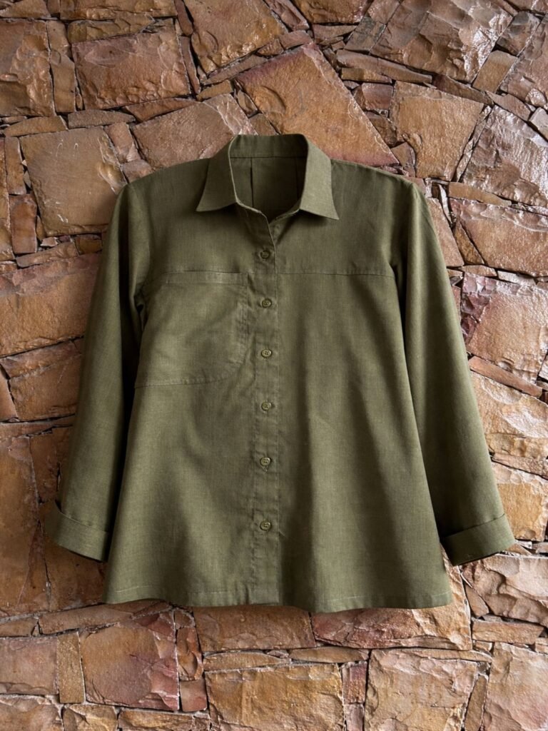 Home match green top