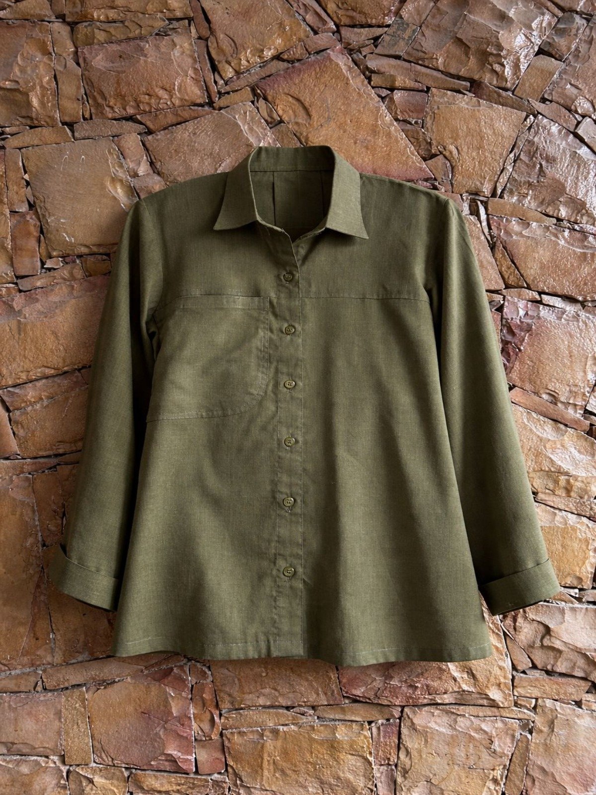 Home match green top